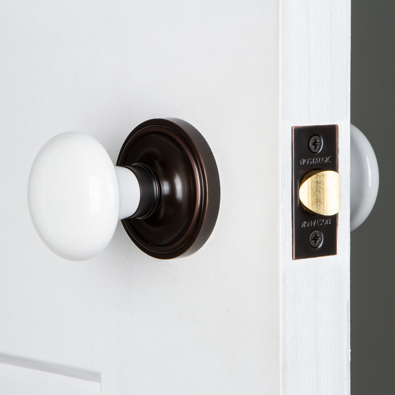 Rosette classique avec bouton de porte en porcelaine blanche, Bronze intemporel, 2,375 po