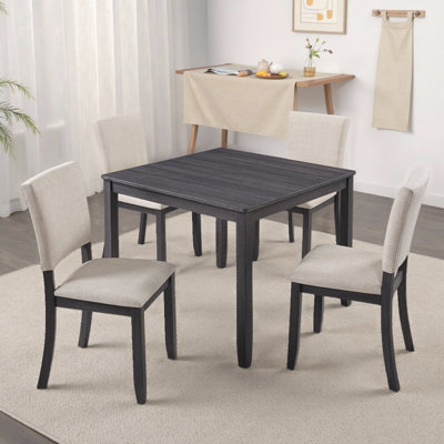 Ensemble de table de salle à manger carrée moderne avec 4 chaises rembourrées, ensemble de cuisine en bois 5 pièces pour une capacité de 4 330 lb?