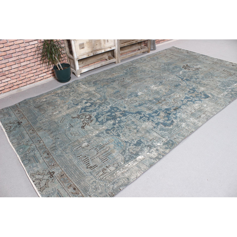 Tapis turc rétro tissé à la main dans des tons de terre, idéal pour rehausser le décor de votre salon ou de votre salle à manger