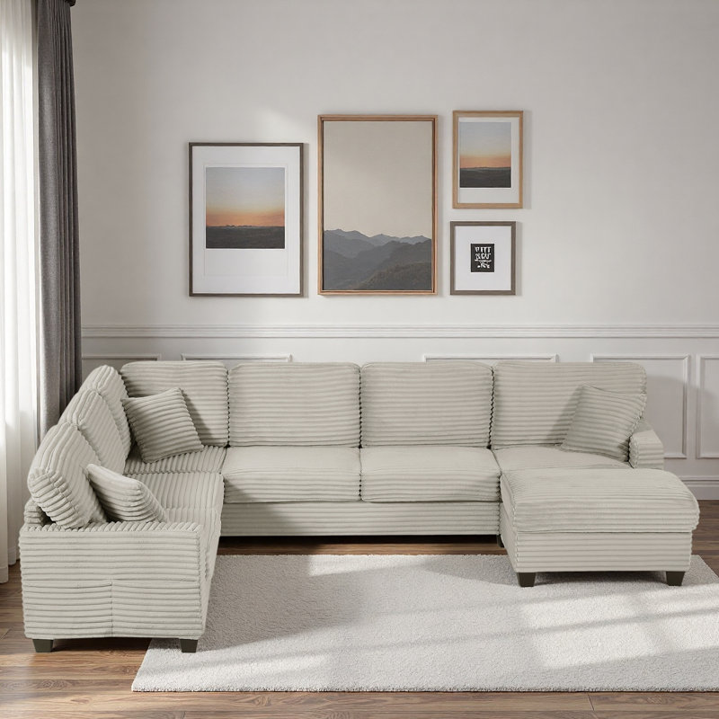 Canapé modulaire avec repose-pieds mobile et poches de rangement latérales