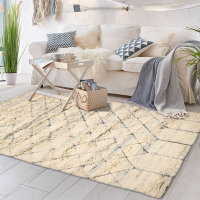Tapis intérieur / extérieur ivoire en laine noué à la main Kolsuma