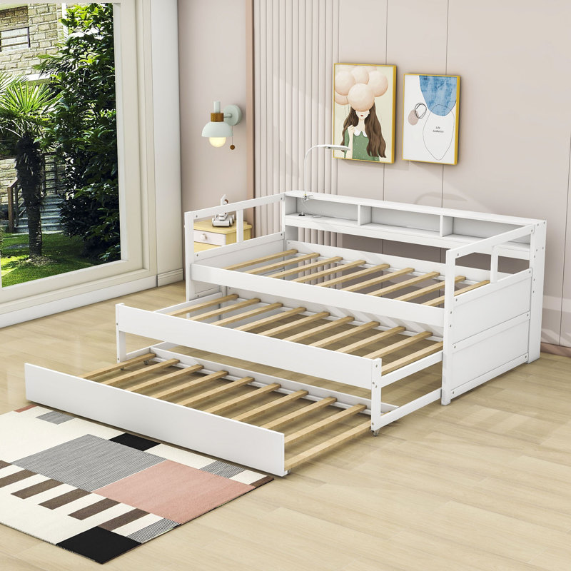 Ajara Twin XL Wooden Daybed with Two Twin Size Trundles and Three Shelves, White