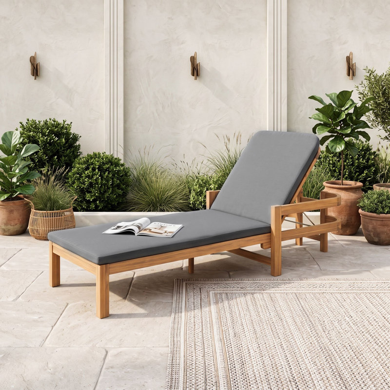 Chaise longue d'extérieur moderne en bois d'acacia avec dossier réglable et coussin résistant aux intempéries