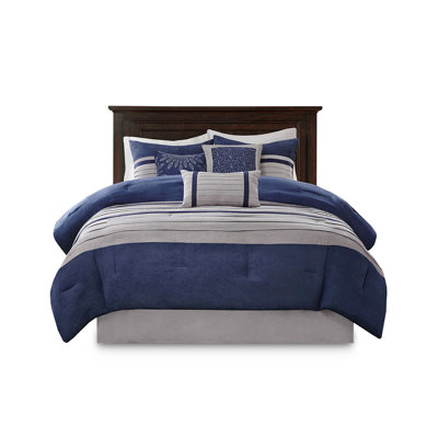 Blue King Comforter . 7 Piece Faux Suede. Filling. Soft Touch Design. Embroidery On Pillows. Includes Comforter, Shams, 3 Pillows, Bed Skirt. Machine Washable. Steam Iron For Smooth Texture.