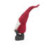 Gnome debout tenant un cadeau