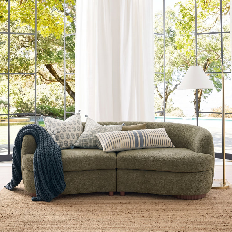 Canapé modulaire 3 places Korrin de 206 cm de large, en boucle moderne incurvée, avec base en bois cannelée, pour salon