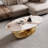 51" Luxurious Oval Coffee Table with Gold Base and Sintered Stone Top