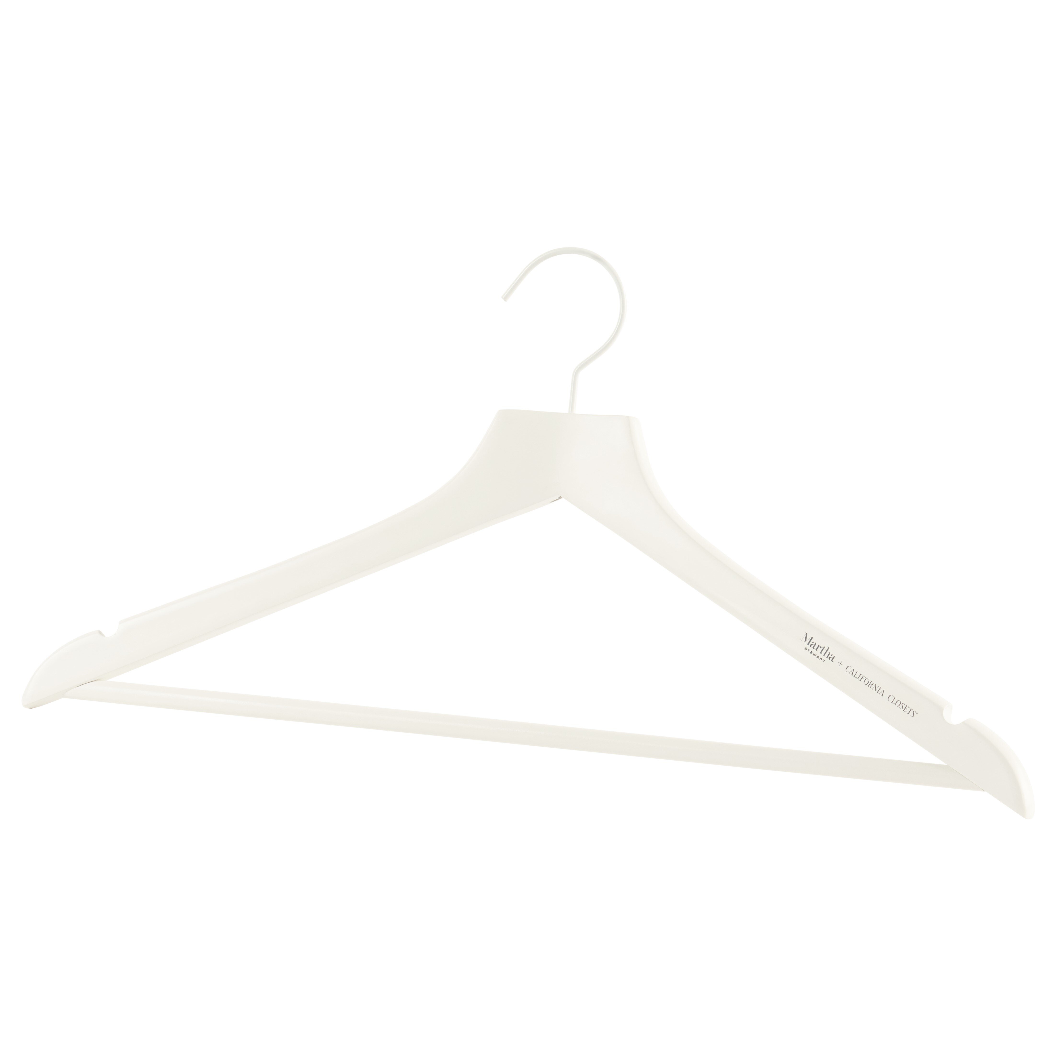 White Cloth On Hangers In White Wardrobe by Stocksy Contributor Martí  Sans - Stocksy