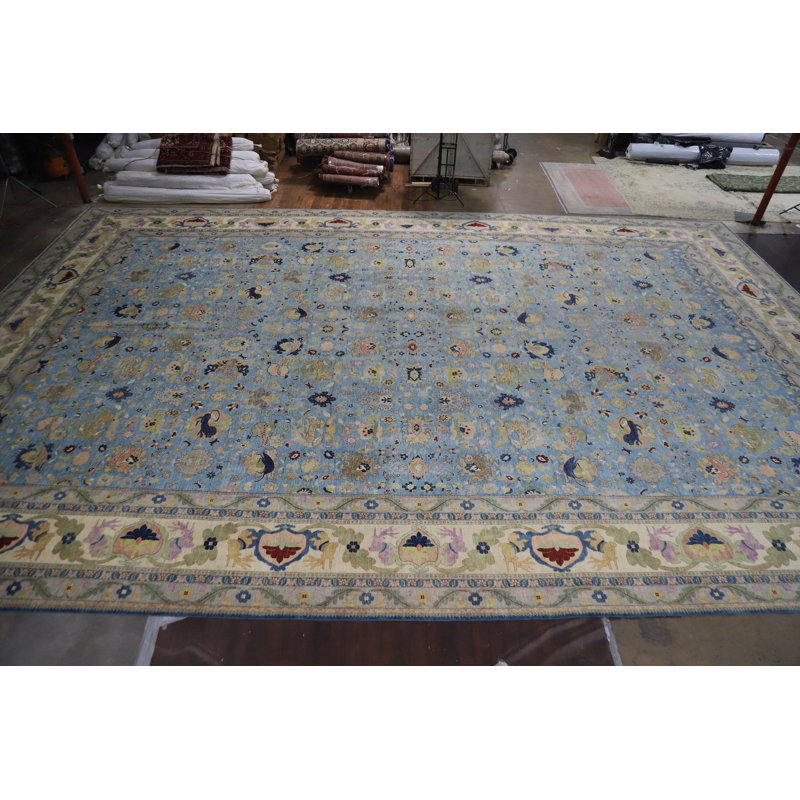 Tapis bleu à motif végétal