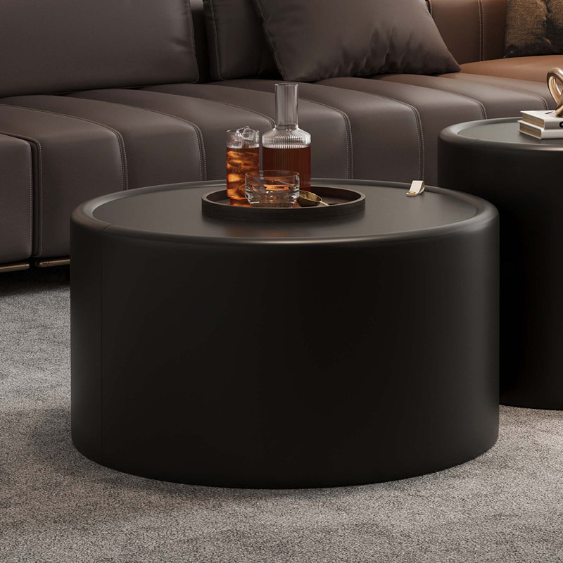 Table basse ronde avec corps en cuir PU et rangement caché pour le salon, Noir
