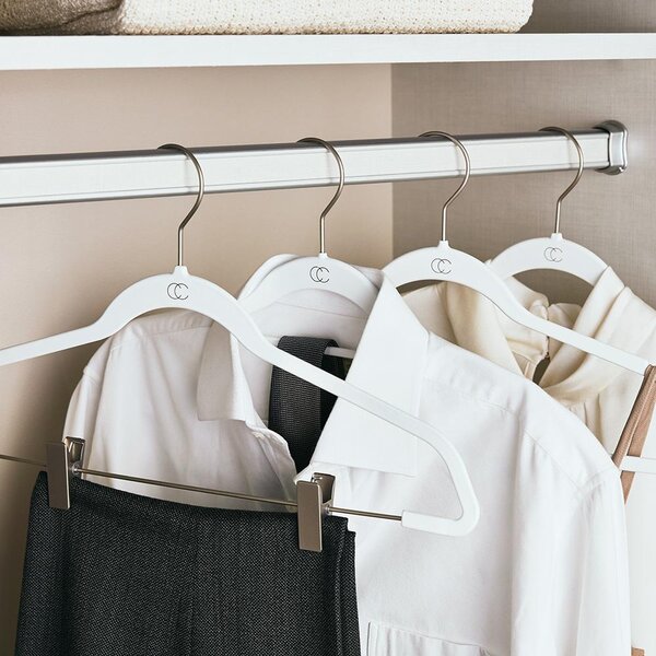 These velvet hangers keep clothes secure and save so much space