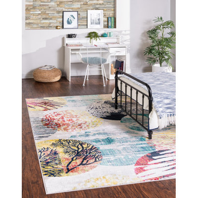 Tapis à motif champêtre et floral de couleur turquoise