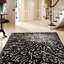 Tibetan Wool Abstract Area Rug in Black/Ivory