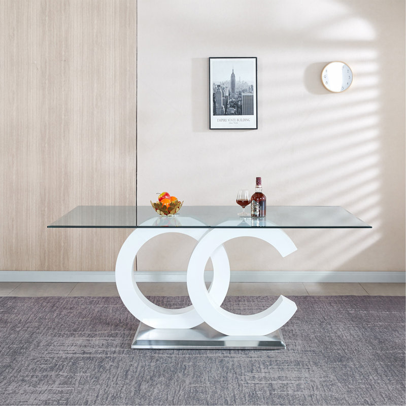 Table de salle à manger moderne en verre trempé avec support en panneau de fibres à densité moyenne robuste et base élégante en acier inoxydable pour une expérience culinaire élégante