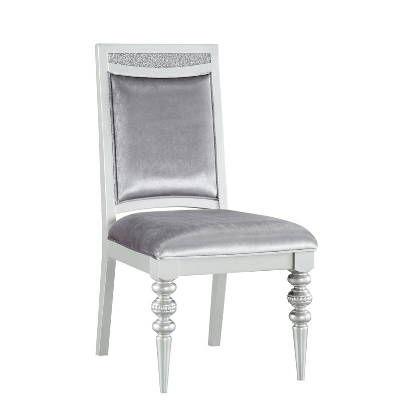 Chaise d'appoint en tissu et platine 2 - Assise fixe, capacité de 100 kg. Profondeur du siège : 51 cm, hauteur : 48 cm. Superbe forme rectangulaire ornée d'incrustations de strass scintillants. Rembourrage moelleux pour le siège et le dossier. Plateau en bois tourné.