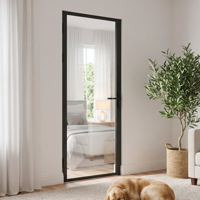 Porte intérieure vitrée transparente en aluminium noir mat 28 po × 80 po, à ouverture battante réversible.