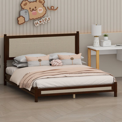 Platform bed frame with headboard features turned legs, boho styling and easy assembly