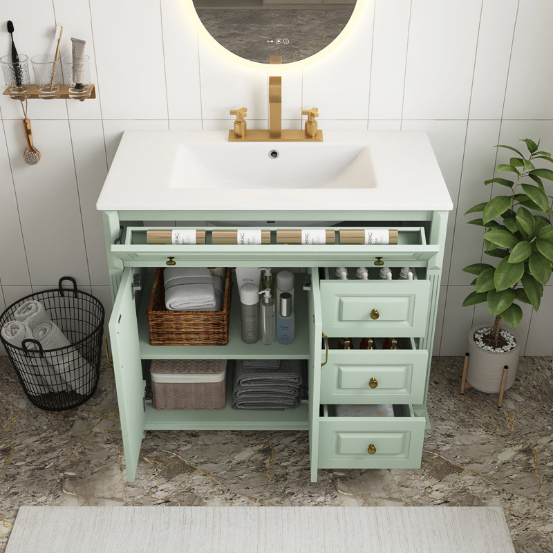Meuble-lavabo vert moderne en MDF de 36 po avec lavabo en céramique, armoire de salle de bain en bois massif avec tiroir rabattable, 3 tiroirs et 2 portes, avec poignées en métal doré