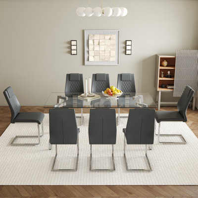 Ensemble de table et de chaises. Table de salle à manger rectangulaire de 71,4 po x 35,4 po. Plateau de table en verre trempé, 7 pieds de table en métal.