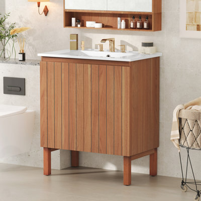 Meuble-lavabo de salle de bain avec lavabo en céramique et portes sans poignée à 45 °