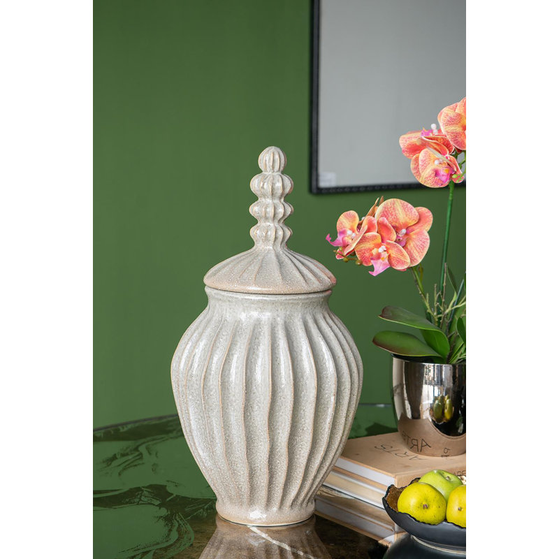 Elegant White Ceramic Jar with Textured Motif and Spherical Finial Lid