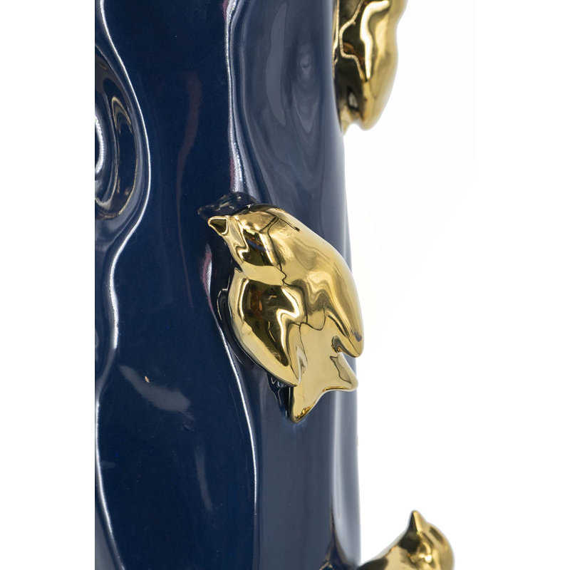 Vase en céramique avec branches d'oiseaux