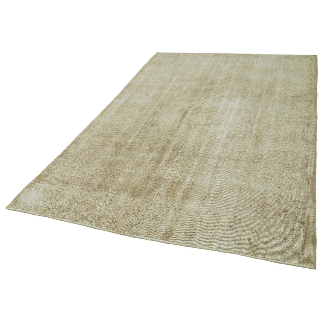 Handgefertigter Teppich Egan aus Wolle in Beige