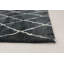 Tapis noir / blanc en laine noué à la main