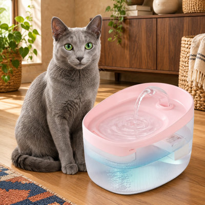Fontaine automatique pour animaux de compagnie de 2,2 L (74 oz) avec deux modes de débit et 4 filtres de rechange, conçue pour les chats, les chiens et les petits animaux d'intérieur.