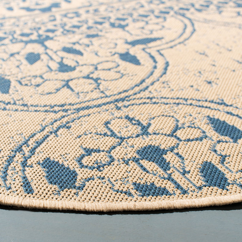 Tapis intérieur / extérieur bleu / crème Danya, Rond 6 pi 7 po