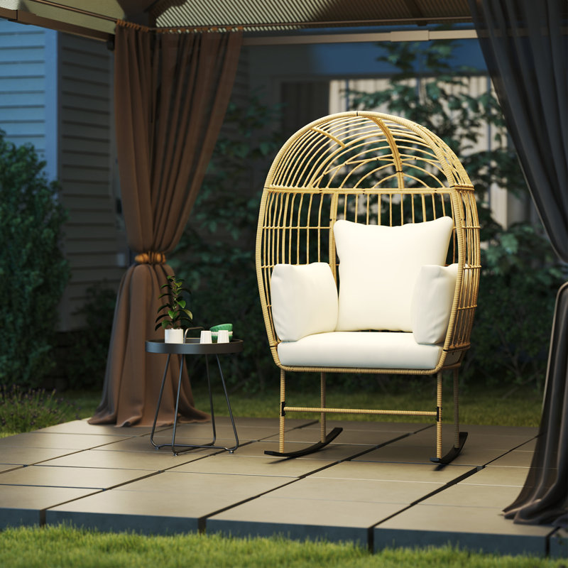 Fauteuil à bascule extérieur en osier avec coussin Wicker