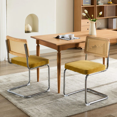 2 Mid Century Modern Dining Chairs, Velvet Covered Chairs With Natural Cane Back & Stainless Steel Base. Remarkable Air Flow. Hand-Woven In Oak Tinge. 360 Pounds Load-Bearing Capacity. Cantilever