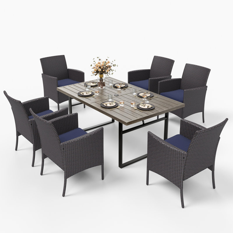 Alyah Rectangular 6 - Person 64" Long Dining Set with Cushions