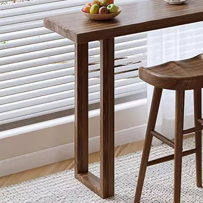 Une grande table de bar en bois massif pour un usage domestique, H 41,30 po x l 55,10 po x P 15,70 po