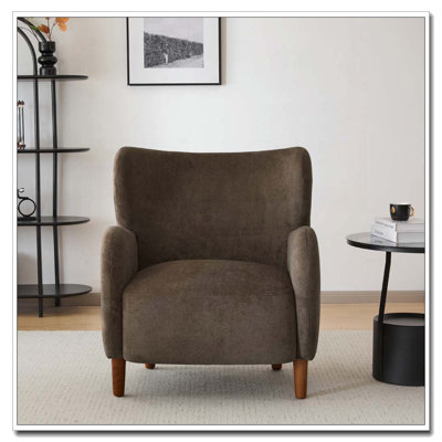 Fauteuil club à oreilles en velours