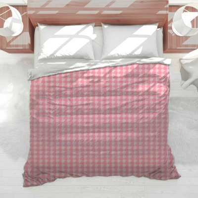Édredon rose à motif pied-de-poule