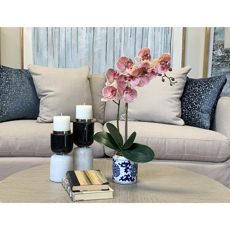 Orchid Arrangement In An Ornate Ceramic Vase