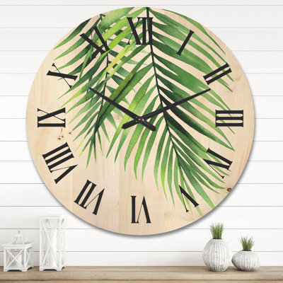 Horloge murale en bois tropical - détail branches de palmier tropical