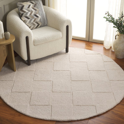 Tapis ivoire en laine / coton touffeté à la main Senya