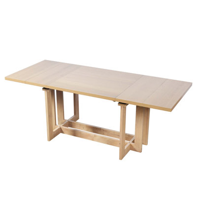 Rustic Extendable Trestle Dining Table with Two Removable Leaves for Flexible Seating and Natural Wood Charm.