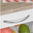 Rolling kitchen cart with storage function, practical wooden frame rolling kitchen island, with wire fruit basket, tray, and drawers, white