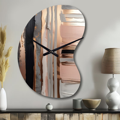 Horloge murale décorative abstraite dorée et or rose