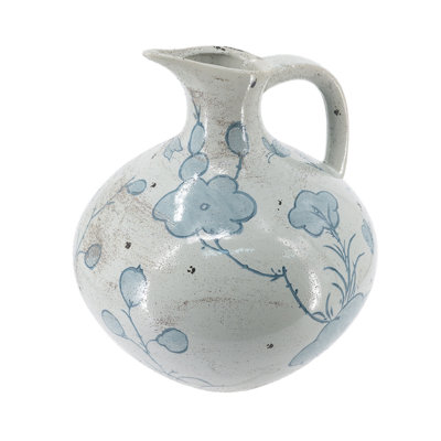 Pichet bulbeux en céramique bleue et blanche de 26,7 x 26,7 x 31 cm, orné d'un motif floral abstrait, style vintage européen façonné à la main, idéal pour une table à manger, une console d'entrée ou une décoration de style campagnard ou côtier.