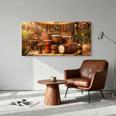 African Drums and Wooden Masks in Market Stall Canvas Wall Art
