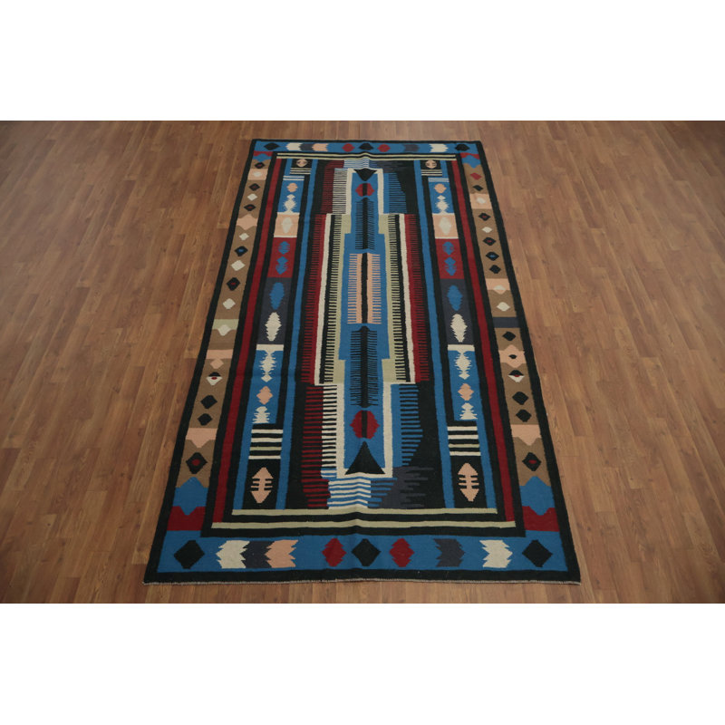 Tapis dynamique Kilim 5 x 10 avec tons terreux
