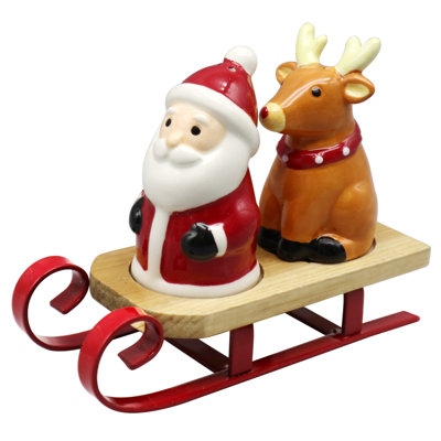 Ensemble de salière et poivrière traîneau Père Noël et renne
