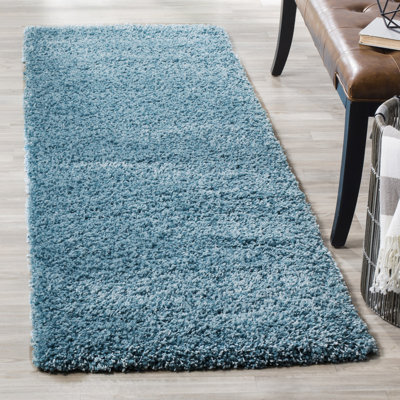 Tapis turquoise Demonte