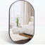 Élégant miroir ovale en métal-117805245-117805244