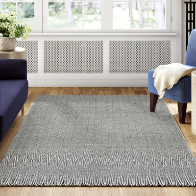 Tapis noir / blanc en laine tissé à plat à la main Rita
