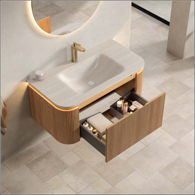 Meuble-lavabo de salle de bain et meuble-lavabo rayé à bords arrondis avec tiroir, lumière à capteur, lavabo intégré en pierre frittée à motif de travertin, pré-assemblé